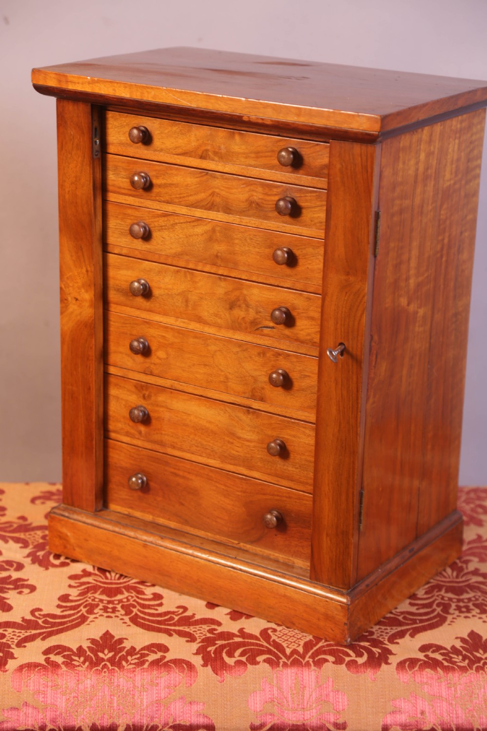 A Miniature Wellington Chest in Walnut View IV