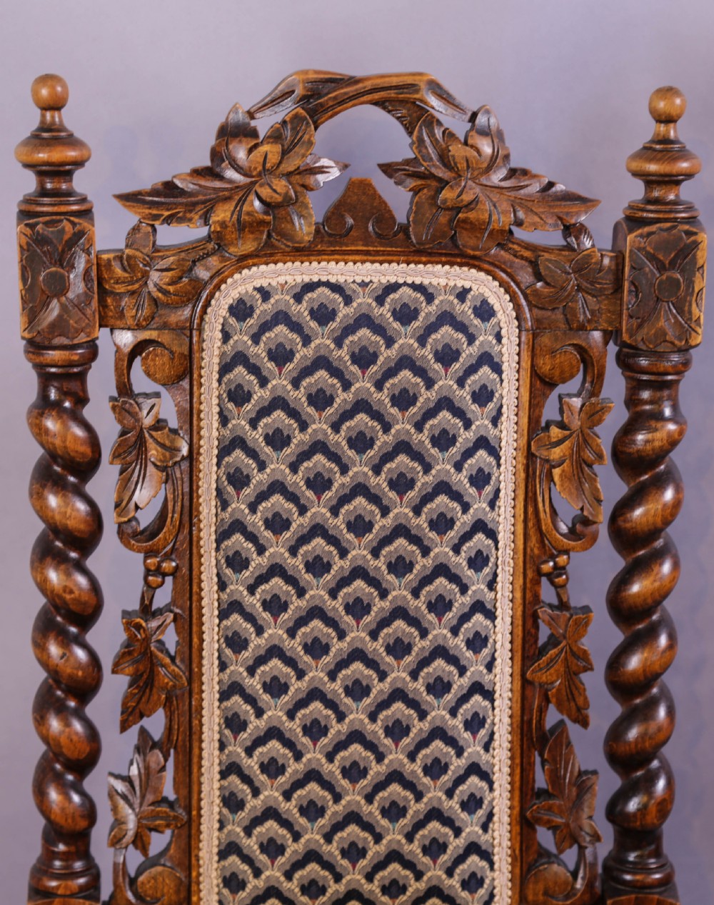 A set of six Victorian carved dining chairs featuring tall backs, barley twist uprights, and patterned upholstered seats. View IX