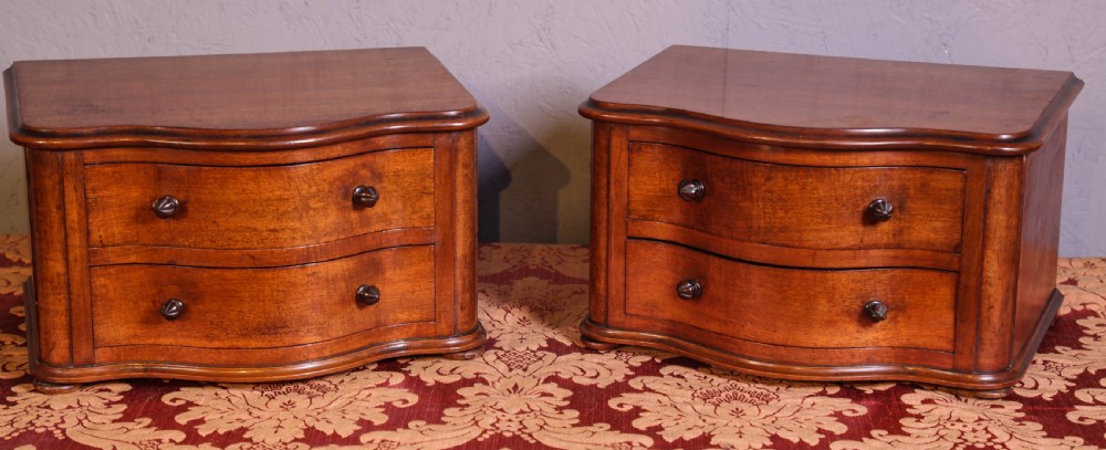 A pair of tiny Chest of drawers