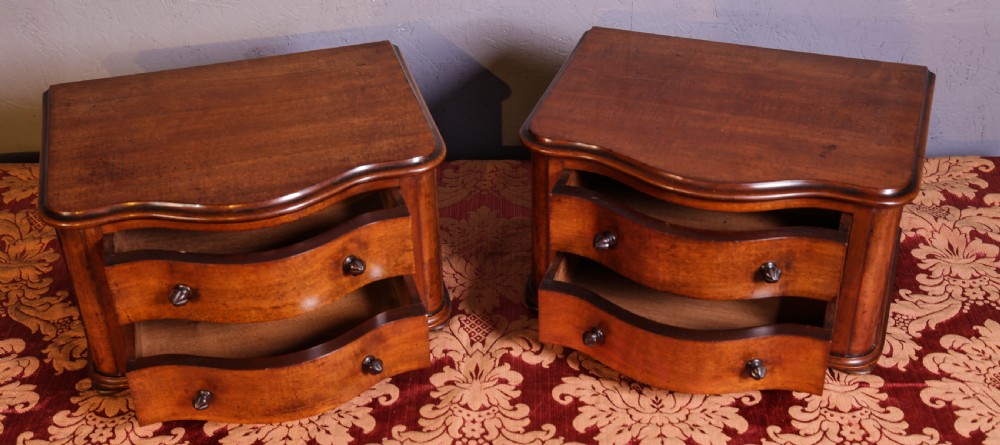 A pair of tiny Chest of drawers View III