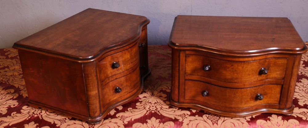 A pair of tiny Chest of drawers View V