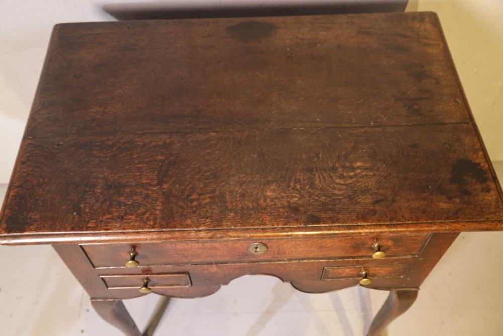 A Good early 18th century Low Boy in Oak, untouched very original View V