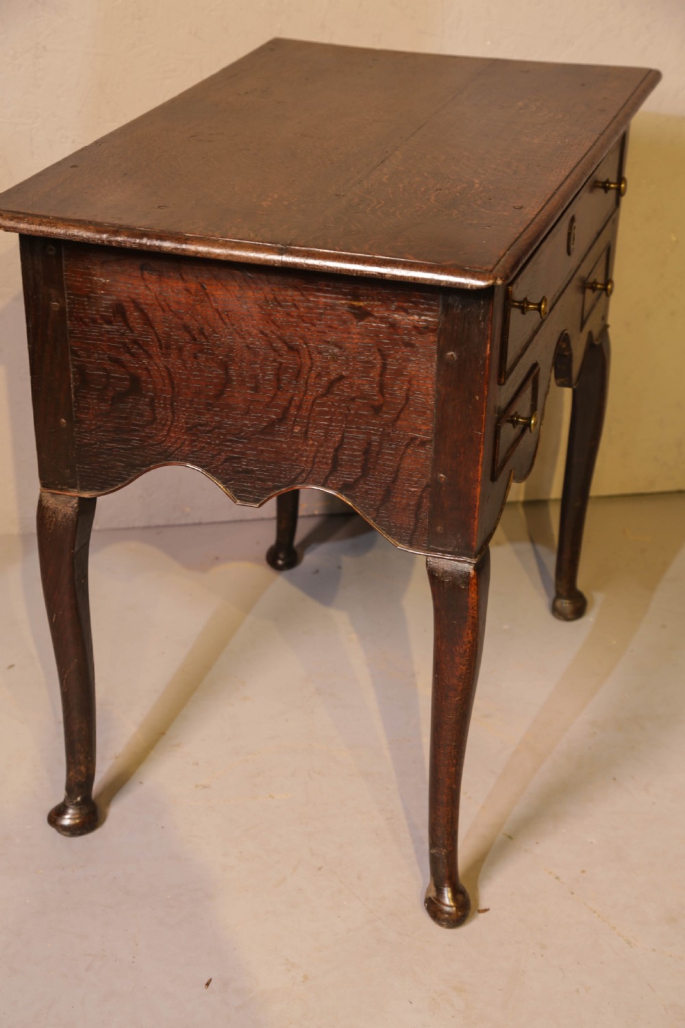 A Good early 18th century Low Boy in Oak, untouched very original View VI