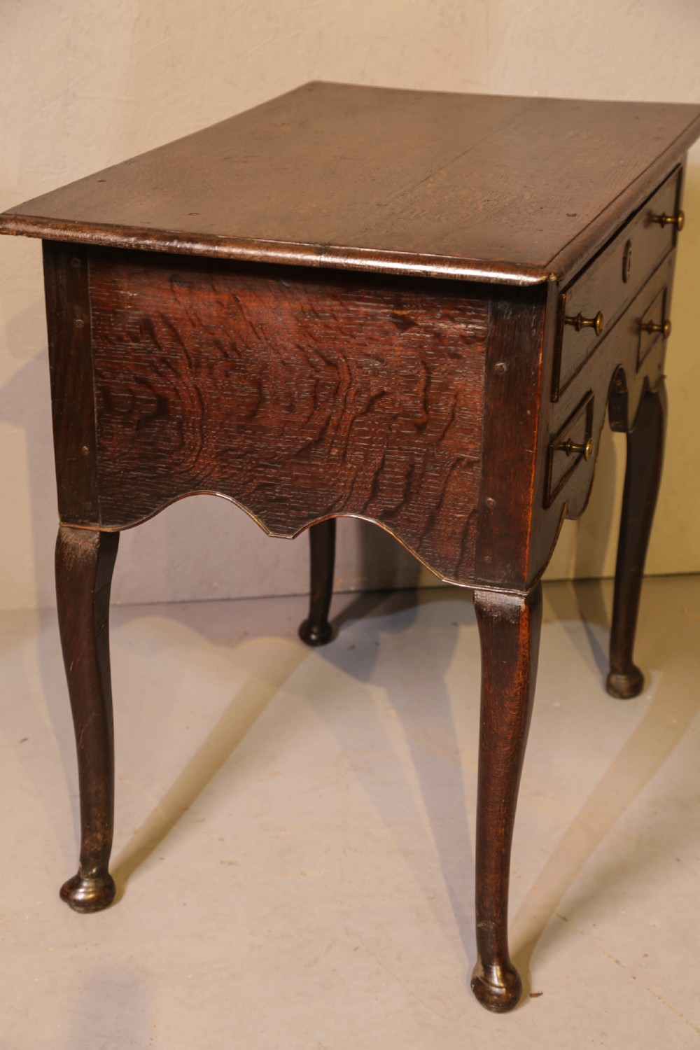 A Good early 18th century Low Boy in Oak, untouched very original View VII