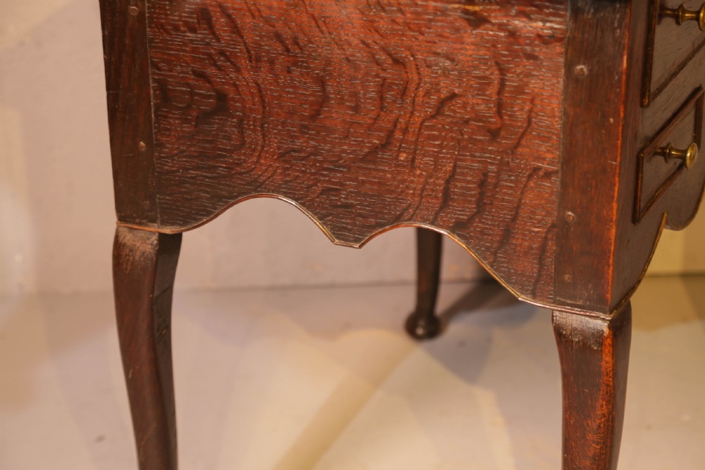 A Good early 18th century Low Boy in Oak, untouched very original View VIII