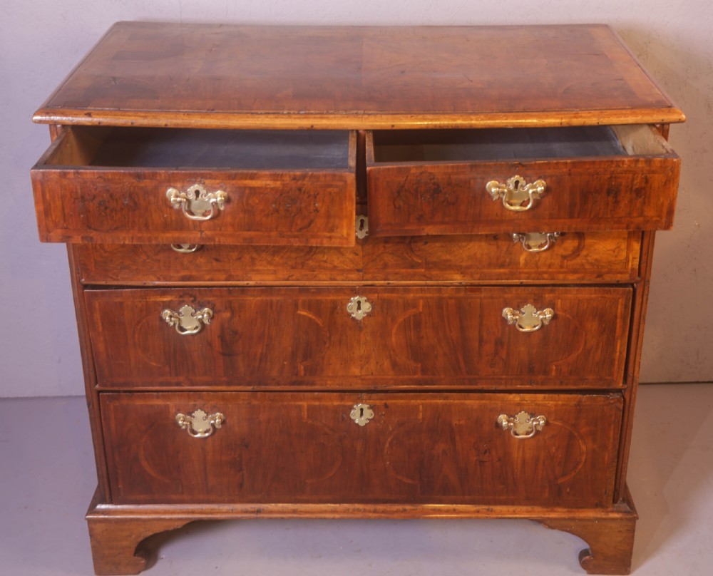 A George I chest of Drawers in figured Walnut View III
