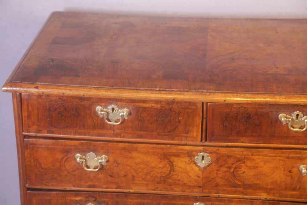 A George I chest of Drawers in figured Walnut View V