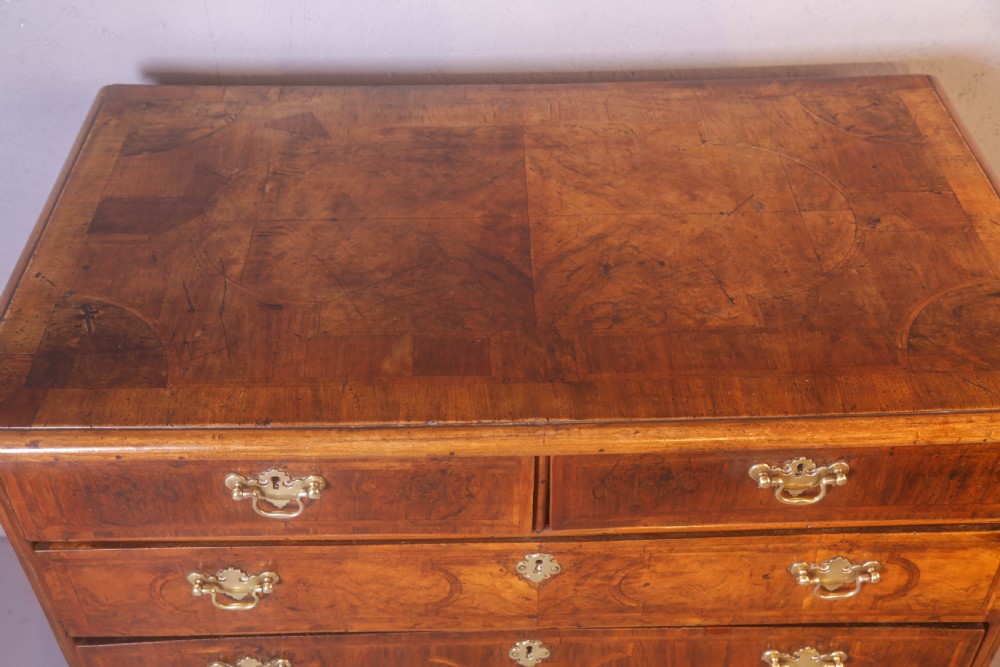 A George I chest of Drawers in figured Walnut View VI