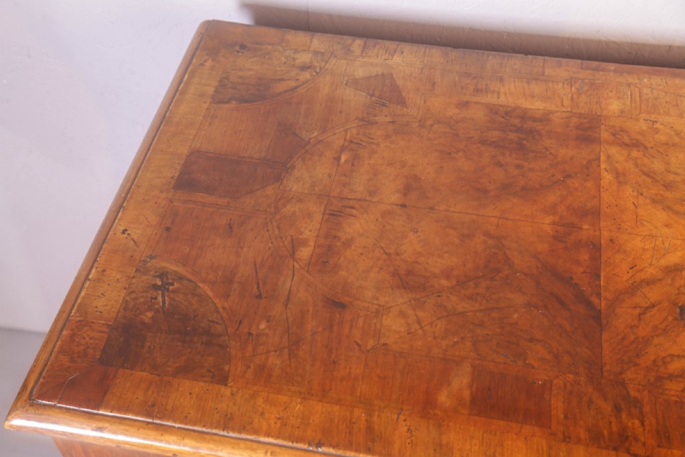 A George I chest of Drawers in figured Walnut View X