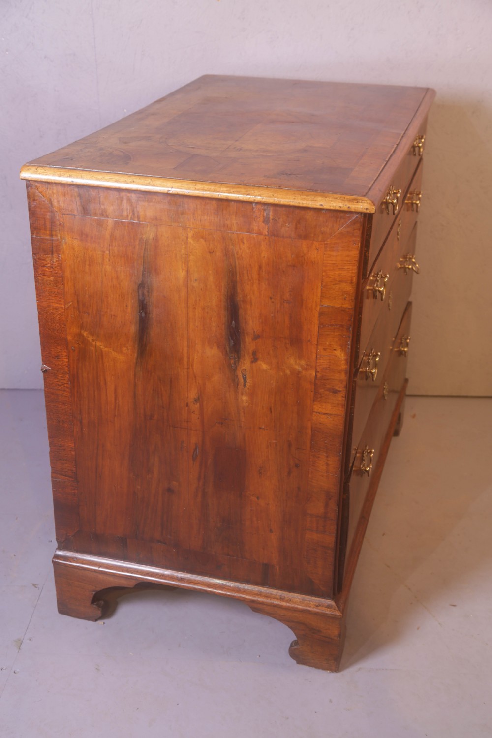 A George I chest of Drawers in figured Walnut View XII