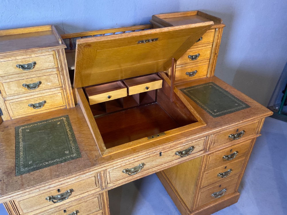 A good dickens desk in pale oak pedestal 3 parts View IV