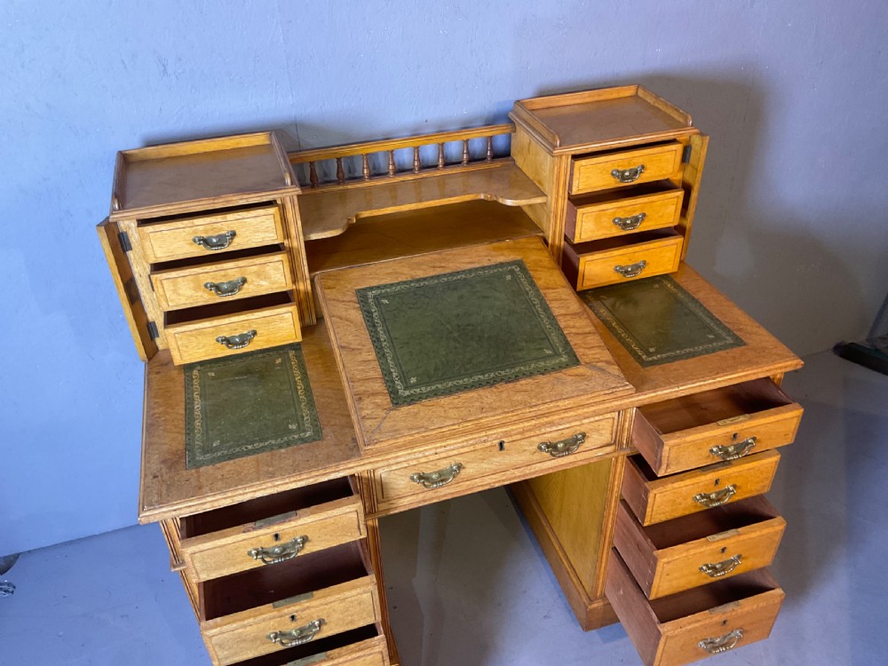 A good dickens desk in pale oak pedestal 3 parts View VI