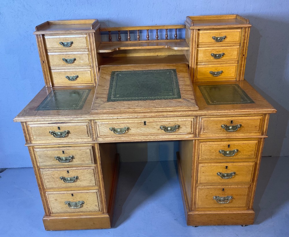 A good dickens desk in pale oak pedestal 3 parts View VII
