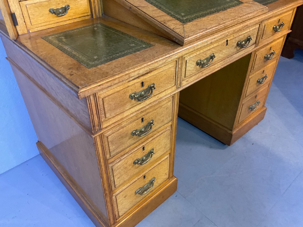 A good dickens desk in pale oak pedestal 3 parts View IX