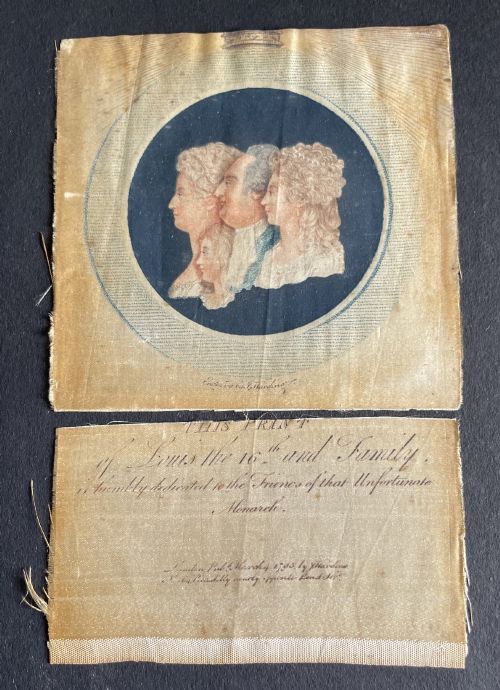 fig 1. An antique silk print depicting profile portraits of Louis XVI and his family inside a circular medallion, enclosed within a deep square mahogany frame.