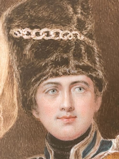 fig 2. A framed portrait miniature depicting Lieutenant General Charles Vane-Stewart in a Hussar military uniform with a busby hat, set inside a heavily carved gold gilt frame.
