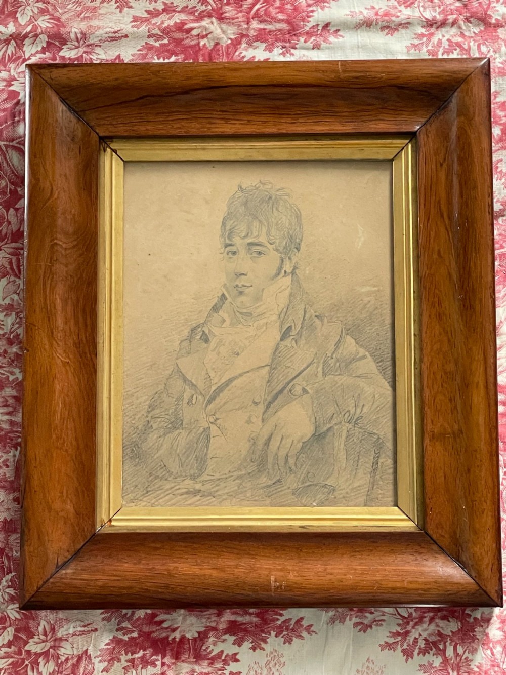 A pair of Regency era graphite portrait drawings framed in wide mahogany mouldings with gilded inner borders. View III