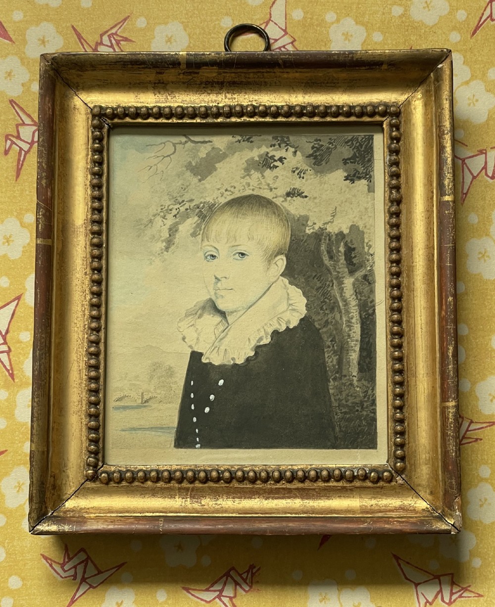 A pair of Georgian watercolour portraits depicting children, framed in matching beaded gilt wood frames with top hanging rings. View III