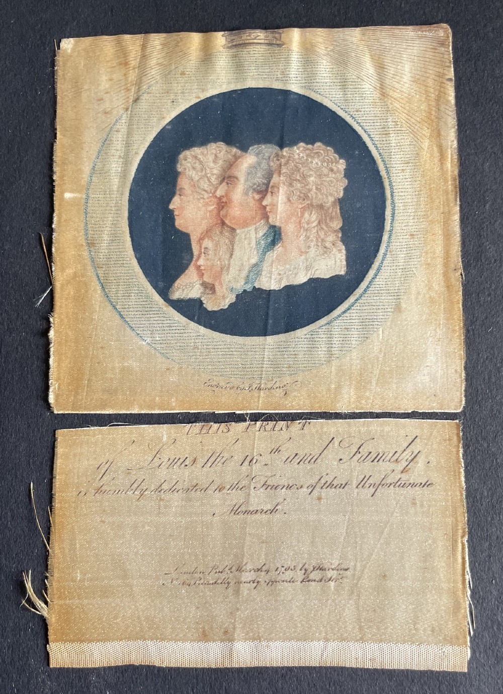 An antique silk print depicting profile portraits of Louis XVI and his family inside a circular medallion, enclosed within a deep square mahogany frame. View II