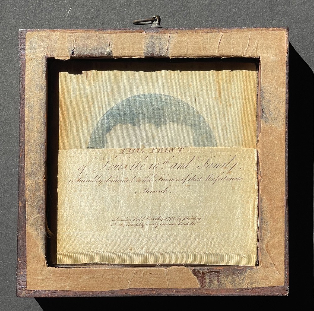 An antique silk print depicting profile portraits of Louis XVI and his family inside a circular medallion, enclosed within a deep square mahogany frame. View IV