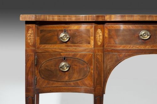 A GEORGE III SERPENTINE SIDEBOARD - ADDITIONAL PHOTO 1