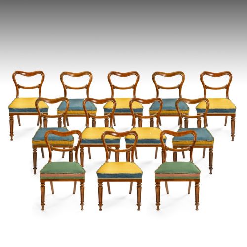 A Long Set of Twelve Late Regency Period Century Dining Chairs