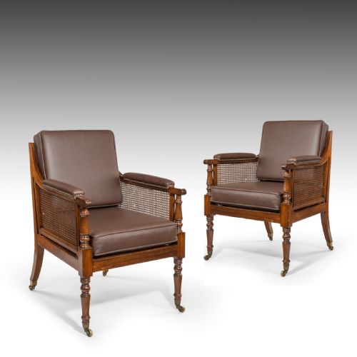 A Pair of Regency Period Library Bergere Chairs
