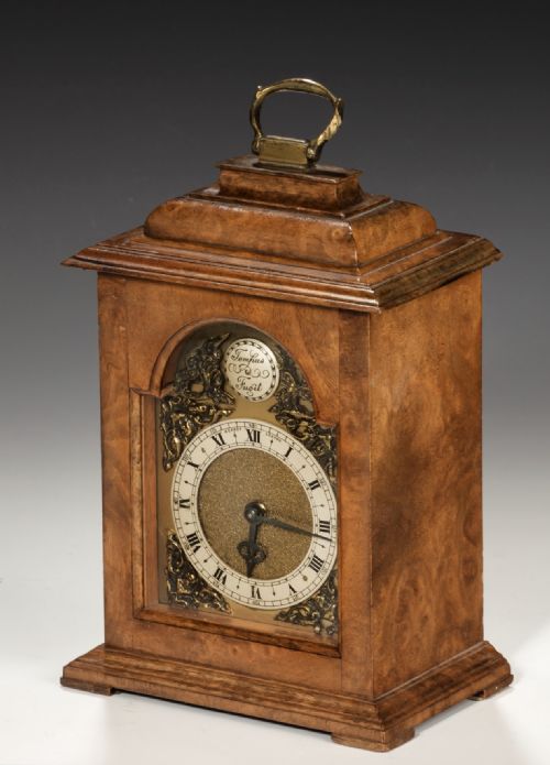 A Miniature Walnut Bracket Clock by Aspreys of London.