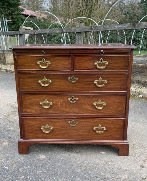 A George II Red Mahogany Chest of Drawers of Narrow Width