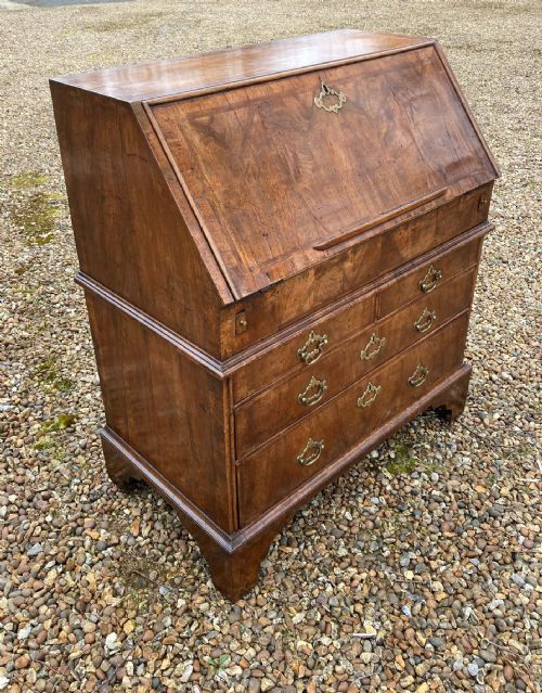 A William and Mary Period Walnut Bureau