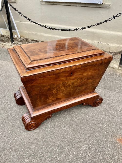 A Regency Period Figured Mahogany Cellaret