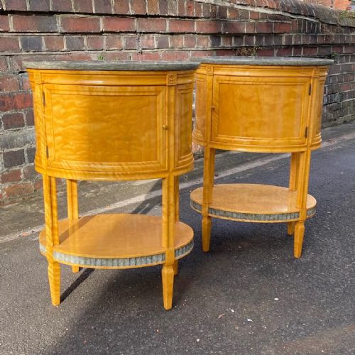 A Pair of Russian Bedside Tables