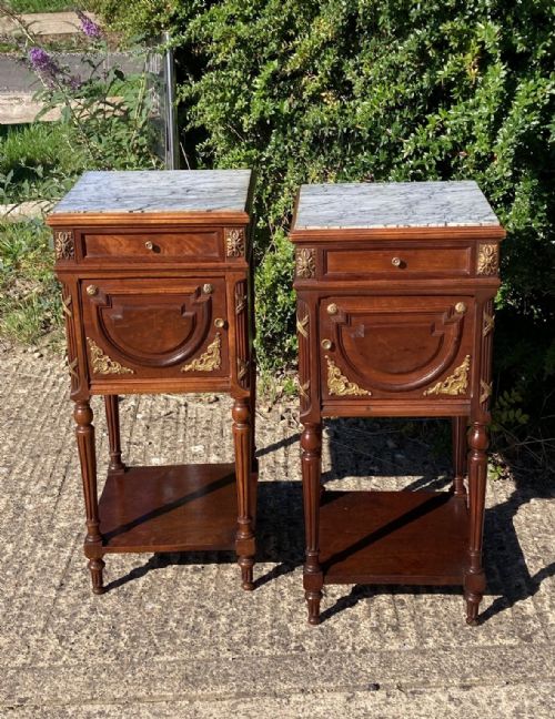 A Pair of 19th Century French Bedside Tables