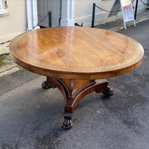 A Regency Period Rosewood and Brass Inlaid Centre Table.