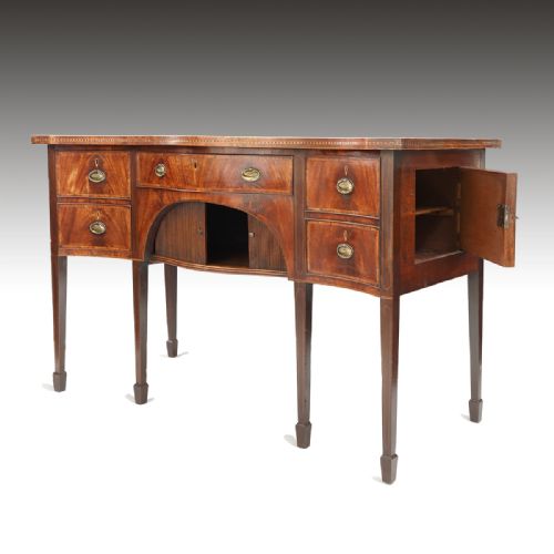 A GEORGE III SERPENTINE SIDEBOARD OF GREAT COLOUR - ADDITIONAL PHOTO 4