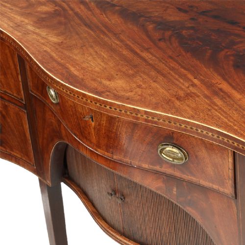 A GEORGE III SERPENTINE SIDEBOARD OF GREAT COLOUR - ADDITIONAL PHOTO 6