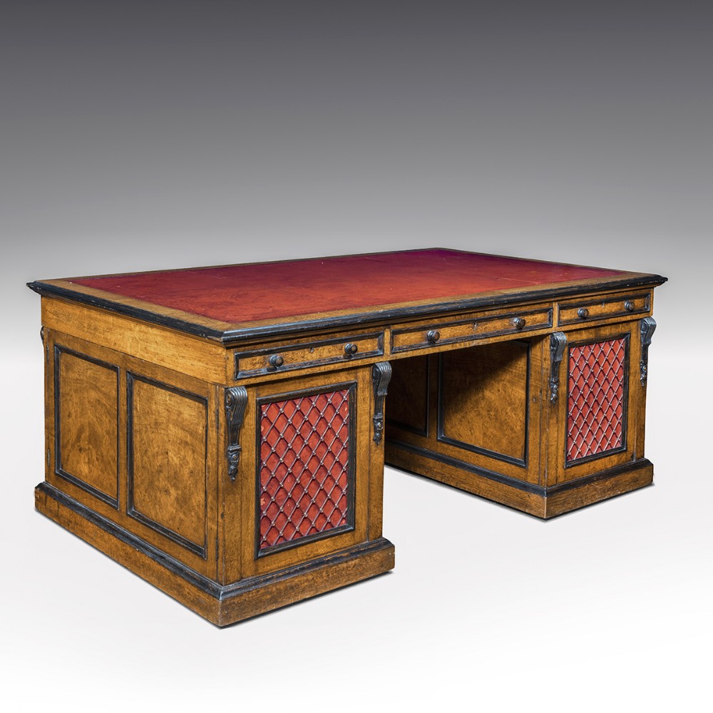 A large Regency period oak partners desk