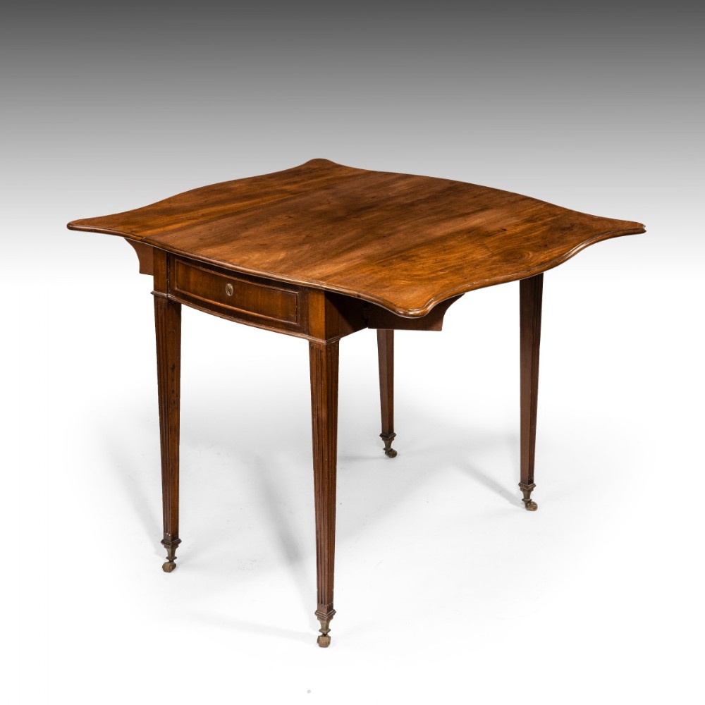 A George III butterfly pembroke table