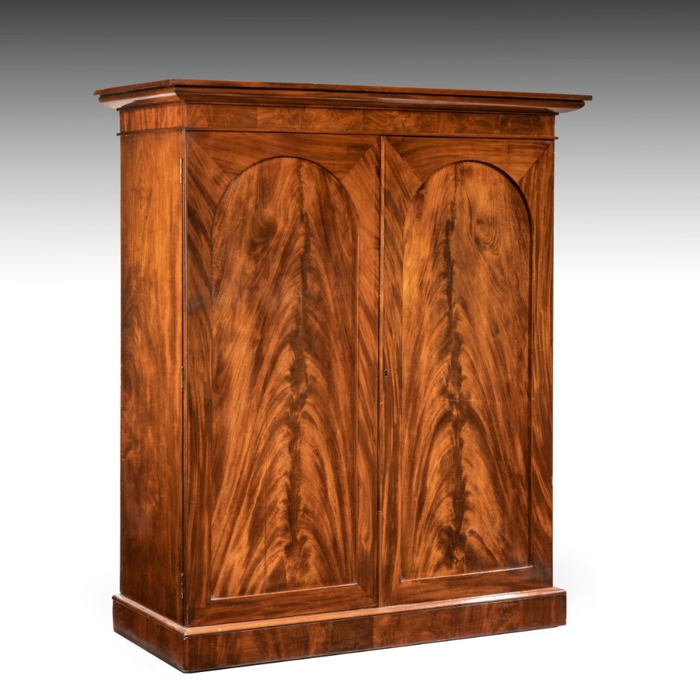 A William IV highly figured wardrobe