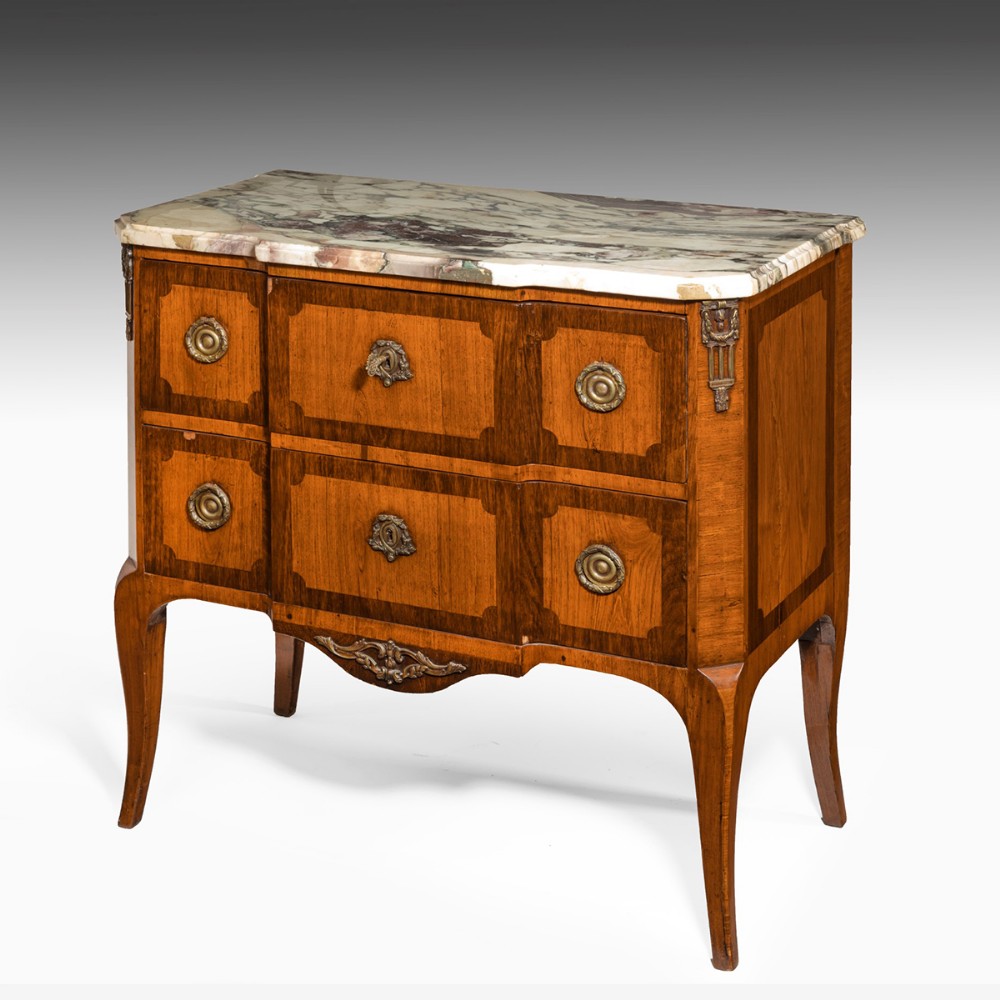 A late 18th century Dutch tulip wood commode 