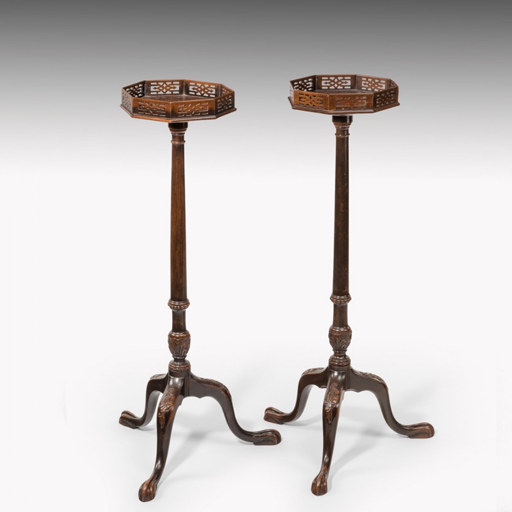 A pair of Edwardian period mahogany torcheres
