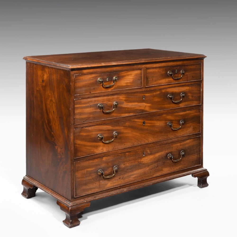 A George III Chest Of Drawers