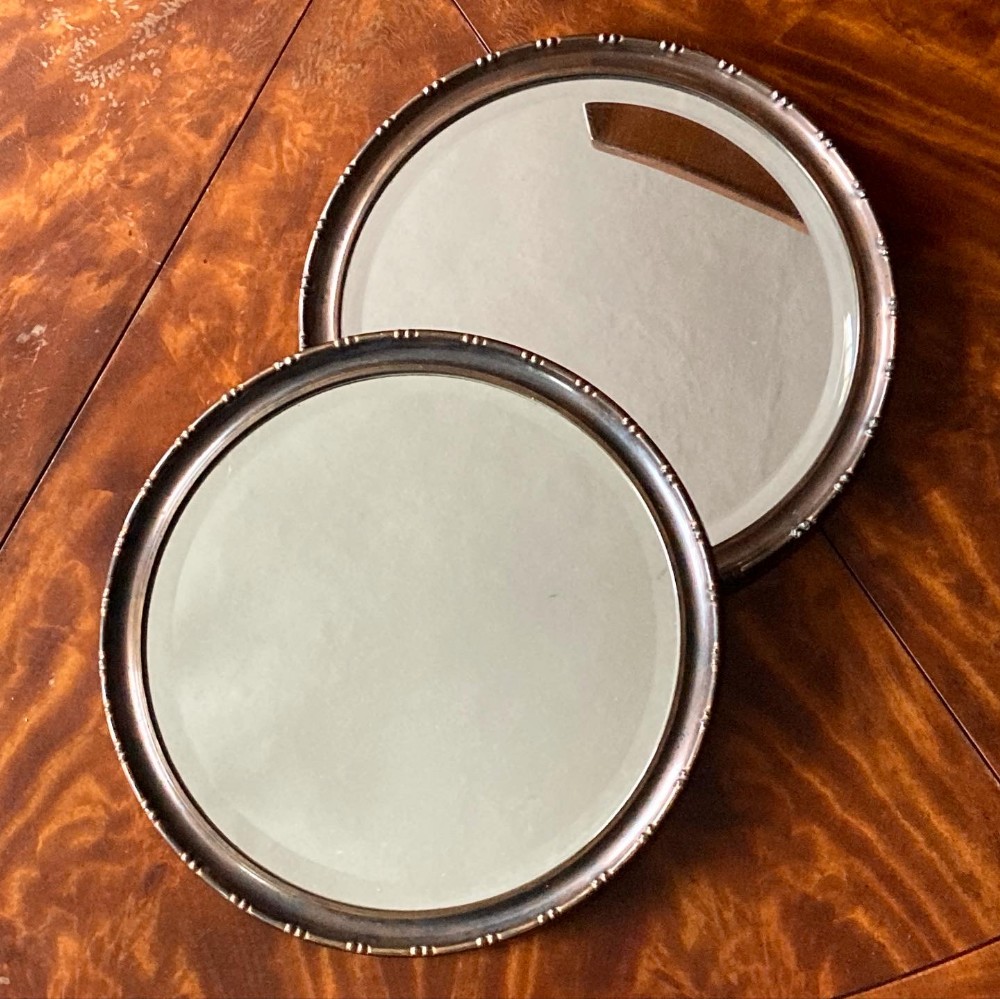 A Pair Of Decorative Copper MIrrors