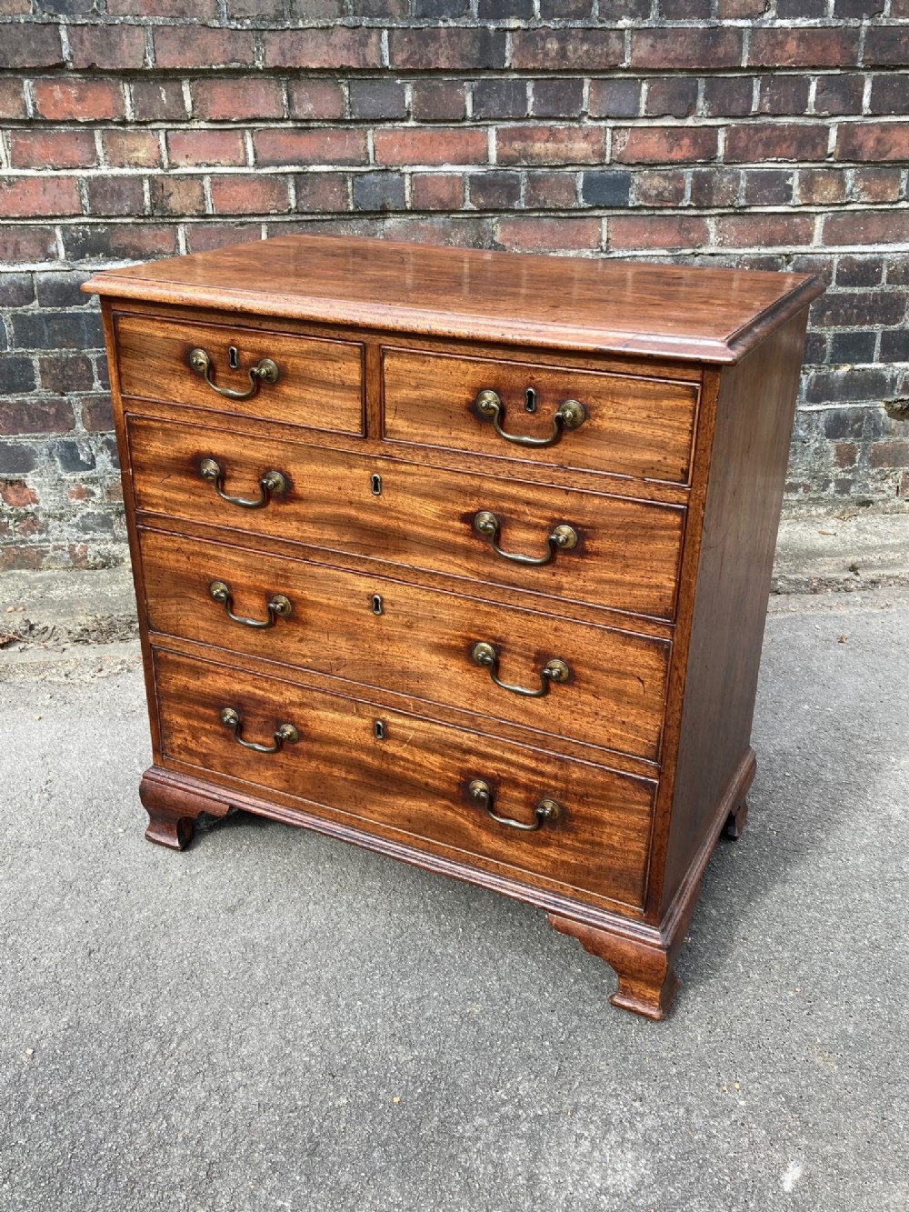 A Small George III Chest Of Drawers