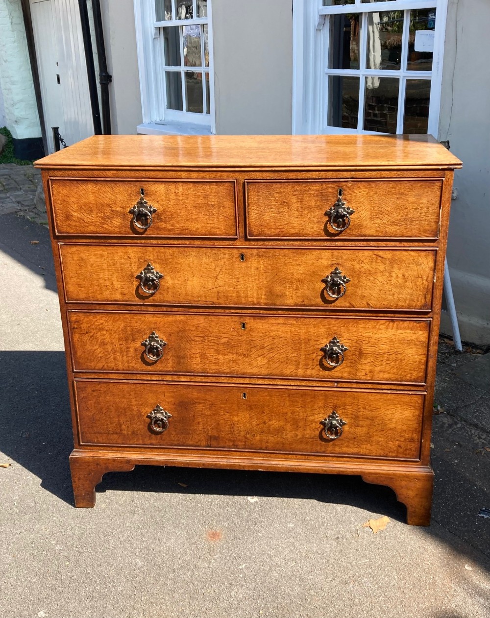 An Arts & Crafts Period Oak Chest Of Drawers