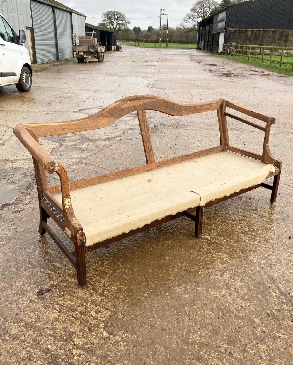 A George III Camel Back Settee