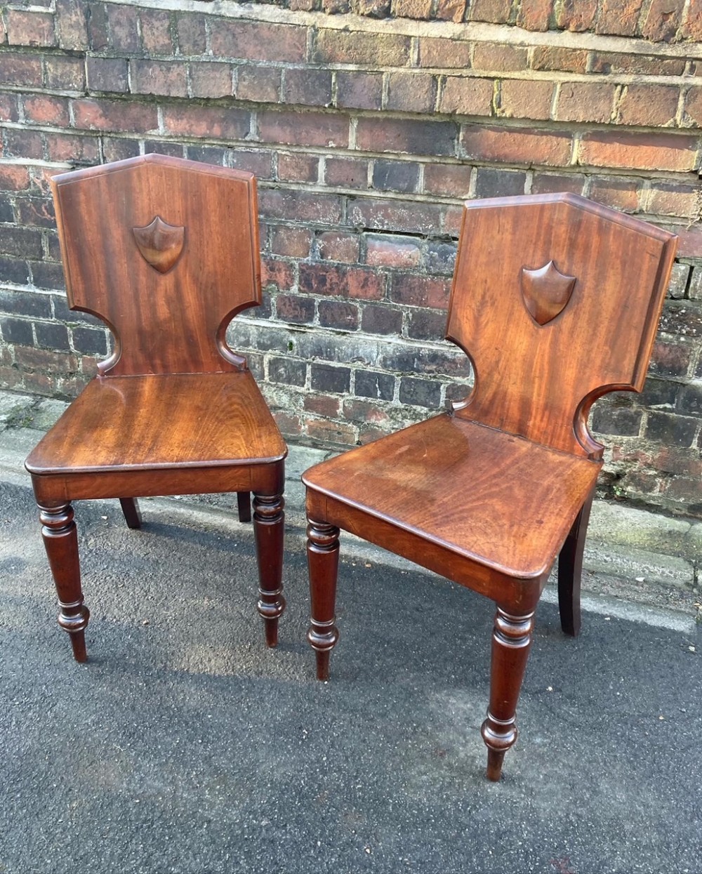 A Pair Of Regency Period Hall Chairs