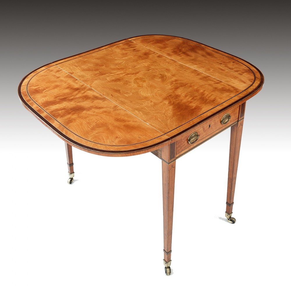 A George III West Indian Satinwood veneered Pembroke Table