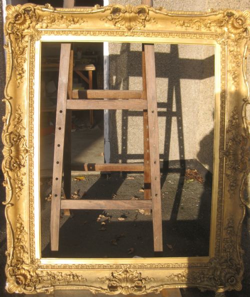 A Very Large Mid 19th Century Swept Gilt Gesso Frame/mirror.