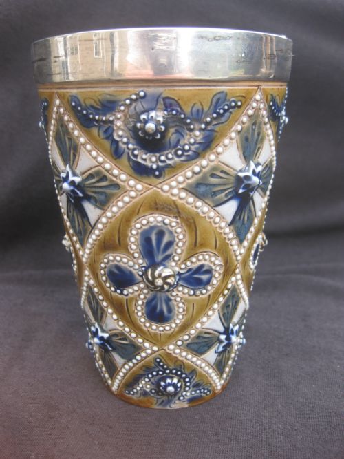fig 1. Doulton Lambeth Stoneware Silver mounted Beaker by Emily E Stormer 1876